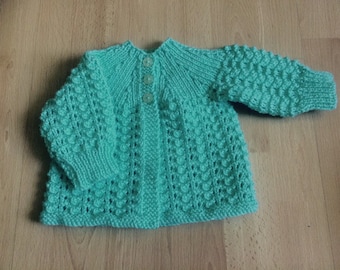 Baby matinee jacket in mint green, hand knitted 0-3 months