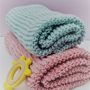 Chunky hand knitted baby blanket. Small or medium in size. Lots of different colours. Made to order.