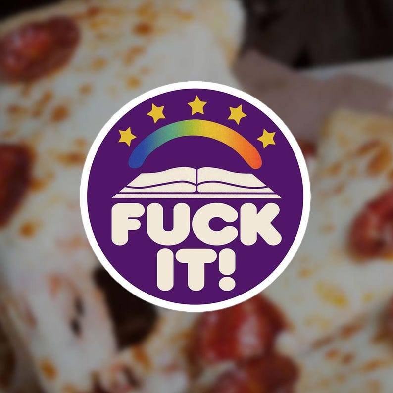May include: A circular sticker with the text "FUCK IT!" in white on a purple background. The design features an open book, a rainbow, and gold stars. The sticker is placed on a pizza.