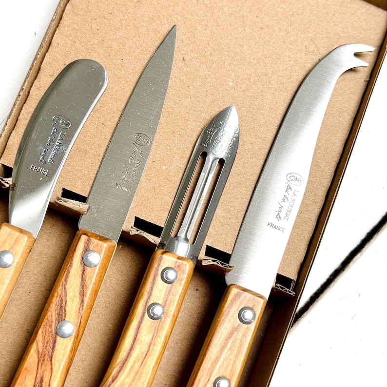 close view on kitchen and cheese set of knives