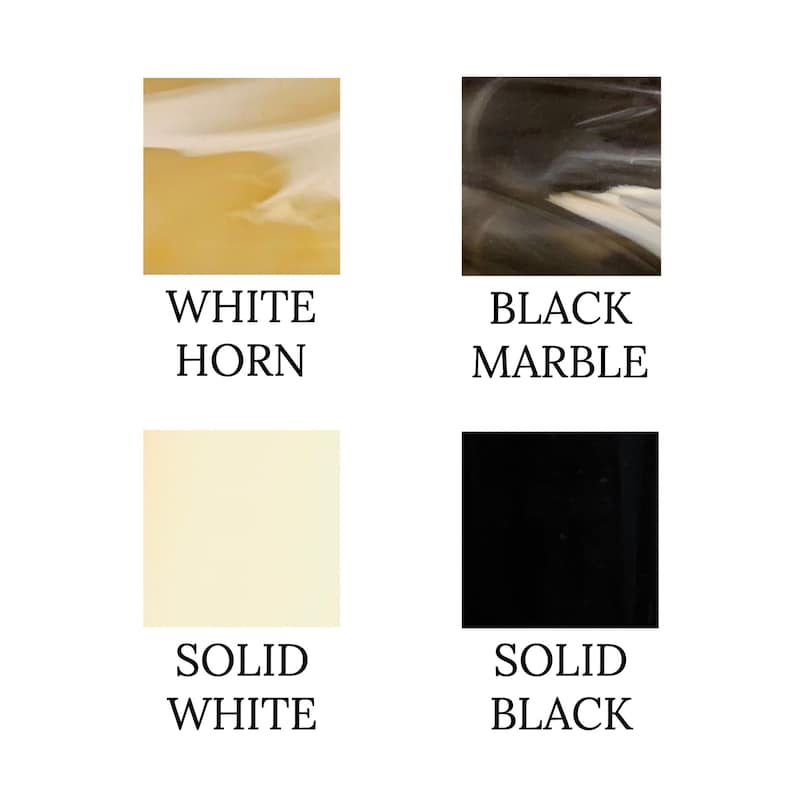 May include: Four samples of materials used for making hair combs. Top left: White horn. Top right: Black marble. Bottom left: Solid white. Bottom right: Solid black.