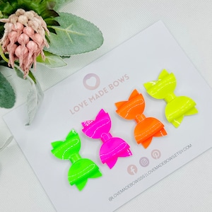 dog hair bows on clips, bows on rubberbands, small hair bows, dog bows for hair, glitter bows, neon bows, summer hair bows, pet accessories
