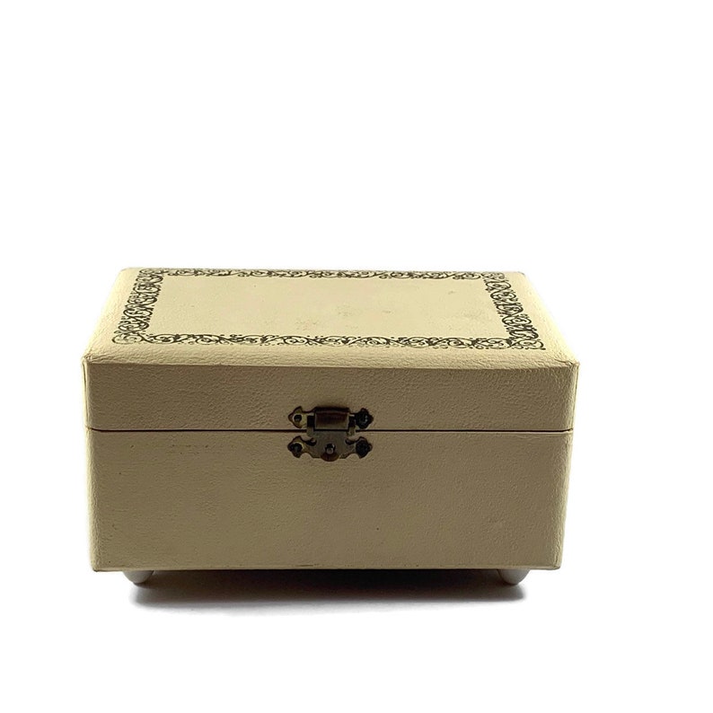 Vintage musical jewelry box plays Blue Denube Waltz