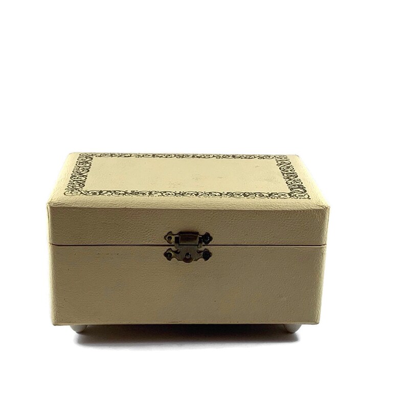 Vintage musical jewelry box plays Blue Denube Waltz