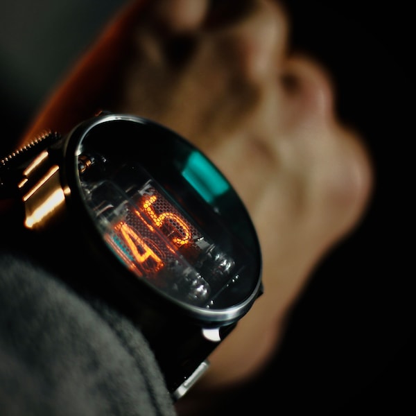 NIWA Nixie watch. Titanium Neptune (raw) case. IN-16 tubes. V2.0. Wireless charging.