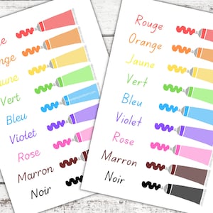Puede incluir: Dos hojas de papel con las palabras francesas para los colores, "Rouge", "Orange", "Jaune", "Vert", "Bleu", "Violet", "Rose", "Marron" y "Noir", impresas junto a un tubo de pintura del color correspondiente.