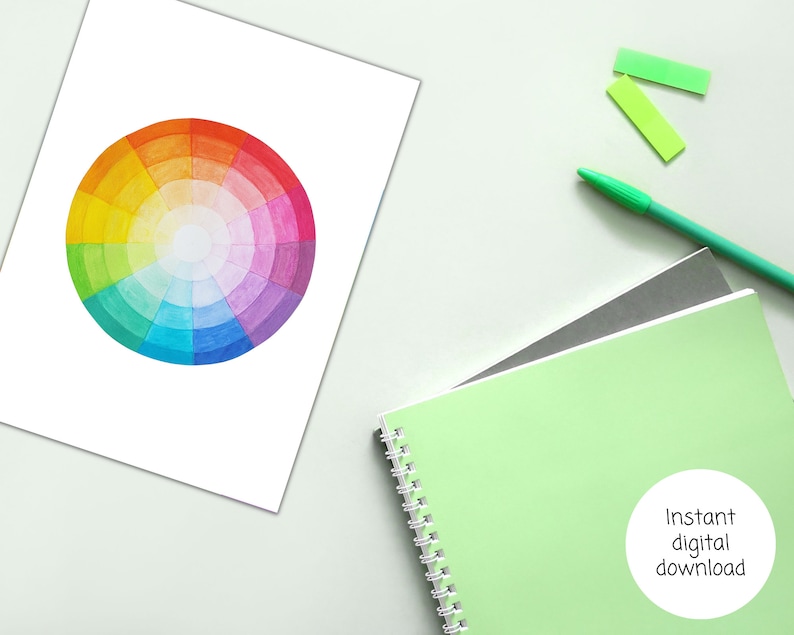 May include: A watercolor painting of a color wheel with 12 colors. The colors are arranged in a circle, with the primary colors (red, yellow, and blue) at the top, and the secondary colors (orange, green, and purple) in between. The tertiary colors are arranged in between the primary and secondary colors.