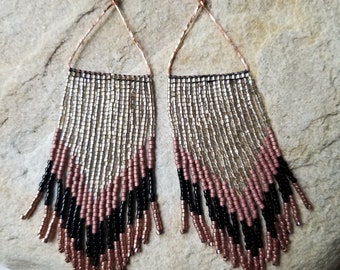 Black, Copper, and Champagne woven seed beaded fringe earrings dangling from handmade hammered copper triangle