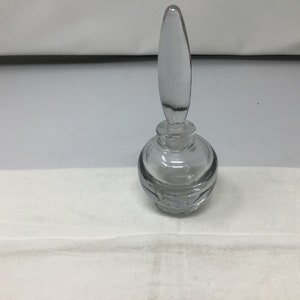 Clear Glass Perfume Bottle With Glass Stopper.