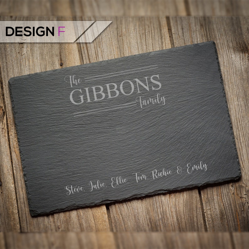 May include: A black slate serving tray with the text "The GIBBONS Family" and the names "Steve, Julie, Ellie, Tom, Richie & Emily" engraved in white.