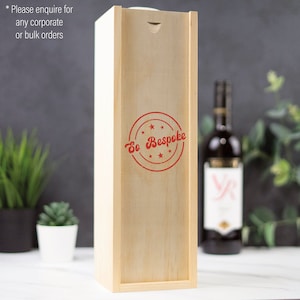 May include: A wooden wine box with a red stamp that says "So Bespoke" with five stars around the text.
