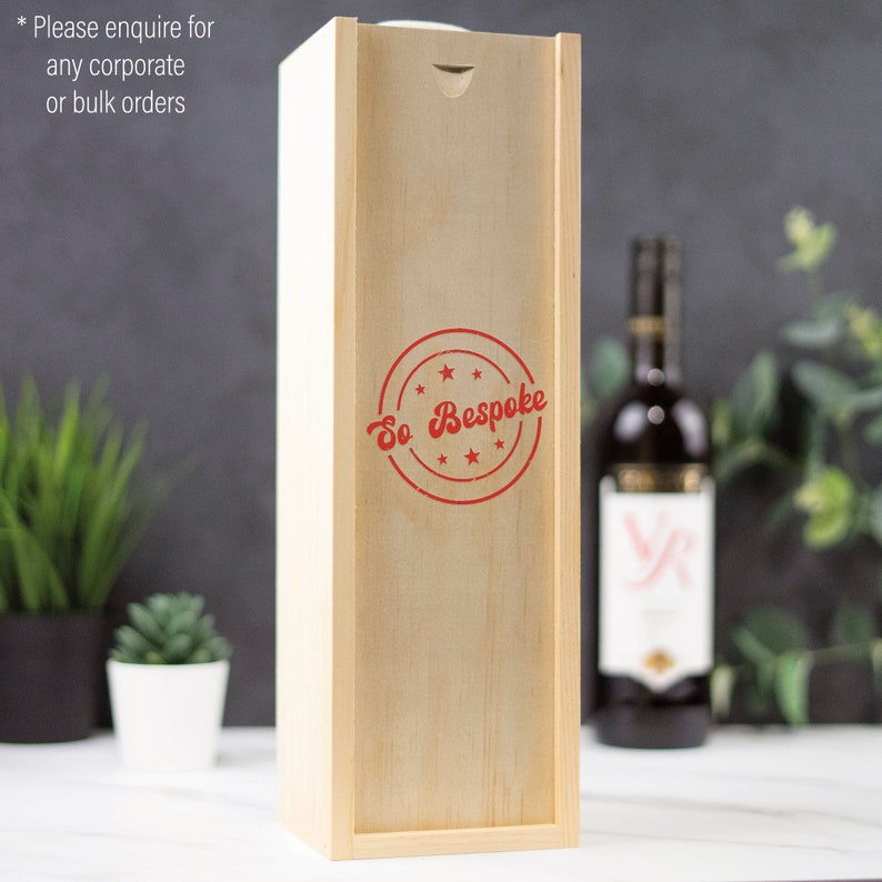 May include: A wooden wine box with a red stamp that says "So Bespoke" with five stars around the text.