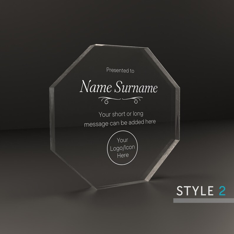 May include: A clear octagonal acrylic award plaque with the text "Presented to Name Surname" and "Your short or long message can be added here". The plaque also has a circle with the text "Your Logo/Icon Here".