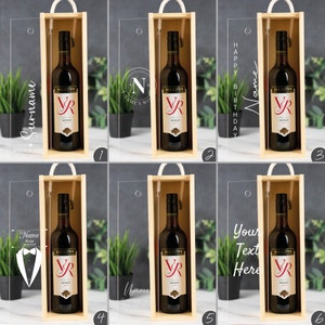 May include: Six different designs for a personalized wine gift box. Each box features a clear acrylic panel with a custom design and a bottle of red wine. The designs include a name and surname, a monogram, a happy birthday message, a tuxedo graphic, a name with a wedding date, and a blank space for custom text.
