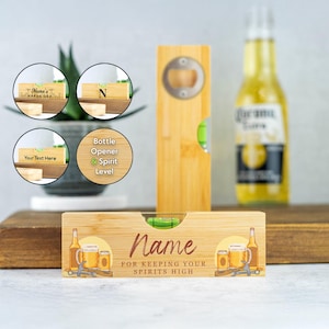 May include: A wooden level with a bottle opener and a spirit level. The level is engraved with the text "Name for keeping your spirits high" and features a graphic of a beer bottle, a beer mug, and a wrench.