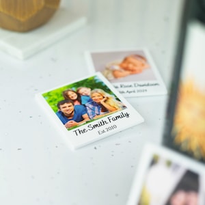 May include: White square photo tile with a family photo and the text "The Smith Family Est. 2010".