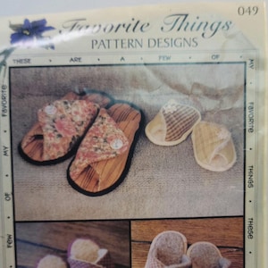 May include: A sewing pattern envelope titled Favorite Things Pattern Designs 049 Pitter Patters. The cover displays four pairs of handmade slippers in various fabric patterns, including floral, plaid, and solid colors, featuring button closures.