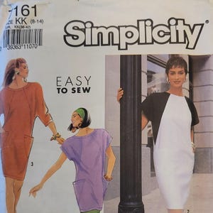 May include: A set of three ceramic mugs with a speckled, matte finish. The mugs are in shades of cream, light gray, and dark gray. Each mug has a simple, minimalist design and a rounded handle.