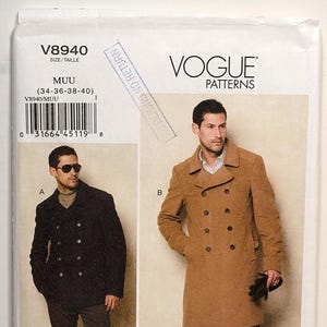 May include: Vogue Patterns V8940 sewing pattern envelope featuring two coat styles. Style A is a black double-breasted pea coat. Style B is a tan double-breasted trench coat. The envelope includes the text V8940, MUU (34-36-38-40), and VOGUE PATTERNS.