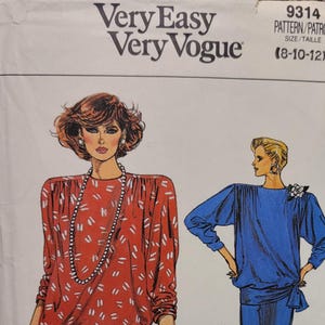 May include: A vintage sewing pattern from Very Easy Very Vogue. The pattern features illustrations of two women's outfits: a red top and skirt with white accents, and a blue dress. The pattern size is 8-10-12.