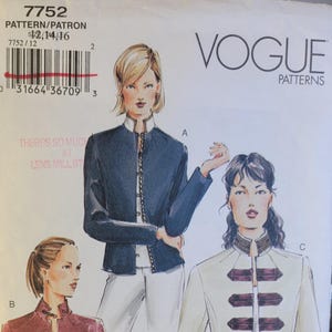 May include: Vogue Patterns sewing pattern with jacket designs. The pattern shows illustrations of jackets in navy, burgundy, and white. The pattern number is 7752, with sizes 12, 14, and 16. The Vogue Patterns logo is displayed.