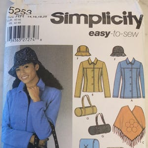 May include: Simplicity easy-to-sew pattern with a woman in a blue jacket and hat, alongside clothing illustrations. Designs include a jacket, hat, bag, and scarf. Pattern sizes are 14, 16, 18, and 20.