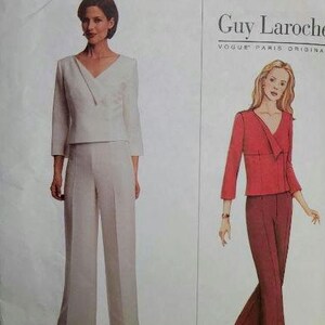 May include: A sewing pattern envelope for a Guy Laroche Vogue Paris Original design. The pattern features a V-neck jacket with three-quarter length sleeves and wide-leg trousers. The envelope displays a photograph and an illustration of the outfit.