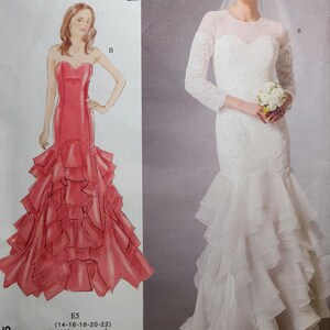 May include: A Vogue Patterns sewing pattern featuring illustrations of two formal gowns. One is a strapless red gown with a ruffled skirt. The other is a white lace wedding dress with long sleeves and a layered skirt. The pattern number is V1495.