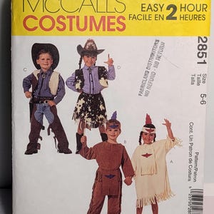 May include: A McCall's Costumes sewing pattern envelope, number 2851, for sizes 5-6. The front displays four children wearing various costumes, including cowboy and cowgirl outfits with fringe and cow print, and two outfits with fringe and bird motifs.