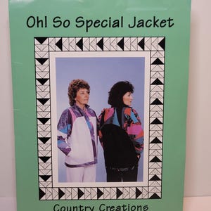 May include: A sewing pattern booklet titled Oh! So Special Jacket by Country Creations. The cover features a light green border with a black and white geometric pattern, and a photograph of two jackets in colorful, abstract fabric designs.