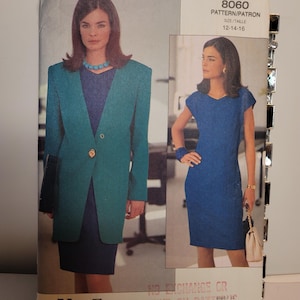 May include: A sewing pattern envelope for Vogue Patterns 8060, featuring illustrations of a teal blazer over a dark blue dress and a separate blue dress. The envelope includes sizing charts, the text Very Easy Very Vogue career, and a barcode.