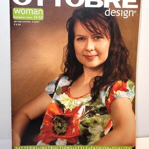 May include: A magazine cover titled OTTOBRE design woman featuring a person wearing a short-sleeved top with a vibrant floral print in red, green, and blue. The cover text includes European sizes 34-52, spring/summer 2/2007, and the website address.