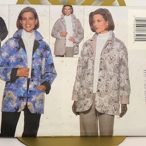 May include: Butterick sewing pattern 5299 for a jacket in sizes 18-20-22. The envelope features illustrations of a button-front jacket with a collar, shown in a blue snowflake print and a grey polar bear print, worn over a white turtleneck.
