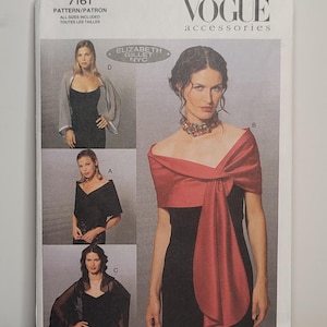 May include: A Vogue Accessories sewing pattern envelope 7161 by Elizabeth Gillet NYC. The front displays four variations of wraps and shawls in different colours and fabrics, including a red wrap, a black wrap, and a sheer grey wrap, all worn over dresses.
