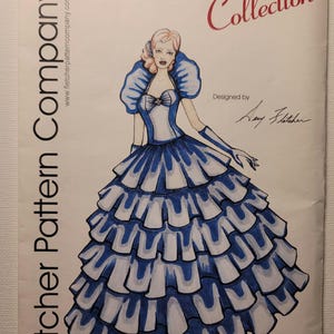 May include: A sewing pattern envelope for the Ellowyne Wilde Midnight in the Garden Collection by Fletcher Pattern Company. The cover features a fashion illustration of a figure in a blue and white ruffled ball gown with matching gloves.