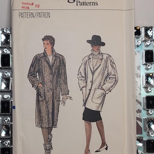 May include: A Vogue Patterns sewing pattern envelope, number 8441, size 10. The front features illustrations of two coats: one long, dark, herringbone-patterned coat and one shorter, light-colored coat worn with a hat, turtleneck, and skirt.