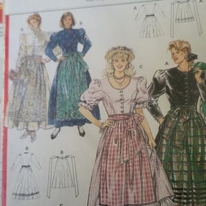 Dirndl dress sewing pattern by Burda for puff sleeve Bavarian dress and apron perfect for Oktoberfest or folk costume uncut and factory fold