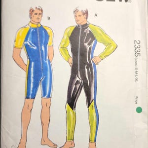 May include: Kwik Sew pattern 2335, showing illustrations of two athletic wear designs. One is a blue and yellow short-sleeved jumpsuit, the other a black and yellow long-sleeved jumpsuit. Sizes: S-M-L-XL. Measurements are in cm.