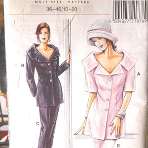 May include: A vintage sewing pattern package with illustrations of women's suits. The package has the text "Avantgarde" and "Multisize Pattern". The illustrations show a black suit and a pink suit.