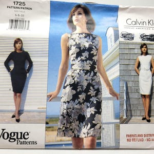May include: A Vogue Patterns sewing pattern envelope labelled 1725 for sizes 6-8-10 by Calvin Klein. The front displays three dress variations: a solid black long-sleeve dress, a sleeveless floral print dress with a belt, and a solid white sleeveless dress.