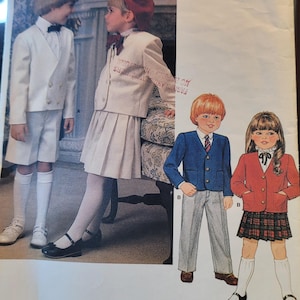 May include: Vintage Little Vogue pattern 1313 featuring children's formal wear. The image shows children in suits, blazers, and skirts. The pattern includes illustrations of various outfits, including a white suit with shorts and a red blazer with a plaid skirt.