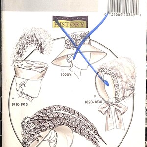 May include: A Butterick B4697 sewing pattern envelope featuring illustrations of four historical hat styles labeled A 1910-1915, B 1820-1830, C 1920's, and D 1890-1900. A blue ink mark crosses out the hat labeled C. The package includes a barcode.