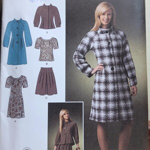 May include: Simplicity sewing pattern 2764 featuring a woman in a plaid coat and dress. The pattern includes designs for a coat, skirt, dress, and top. The pattern size is D5, 4,6,8,10,12.