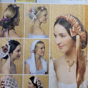May include: Butterick B5663 sewing pattern for historic clothing, featuring various women's headwear designs. The pattern includes bonnets, veils, and headbands with lace, ribbons, and floral accents. The image shows multiple examples of the finished products.
