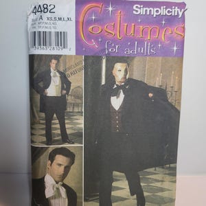 May include: A Simplicity sewing pattern envelope 4482 for adult costumes. The packaging features images of a person wearing a black tailcoat, white vest, and white cravat, and another wearing a black cape, mask, and dark vest. Size range XS-XL.