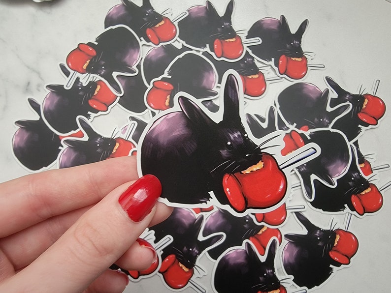 Singer Rabbit Mac Sticker Cute Bunny Eating a Candy Apple Sticker - Premium Matte Vinyl Stickers ...