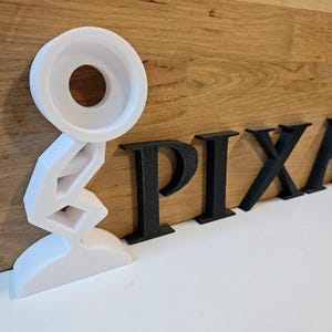 Disney Pixar Logo with Lamp - Luxor