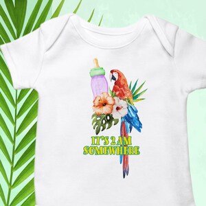 May include: White baby onesie with a colorful parrot, flowers, and a bottle. The text "It's 2 AM Somewhere" is printed in green.