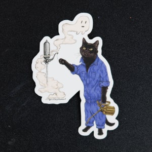 May include: A black cat wearing blue overalls and holding a gold spray bottle. The cat is standing in front of a white background with a ghost and smoke coming from a metal pipe.