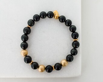 Black semi-precious stone bracelet with stainless steel heart charm for women